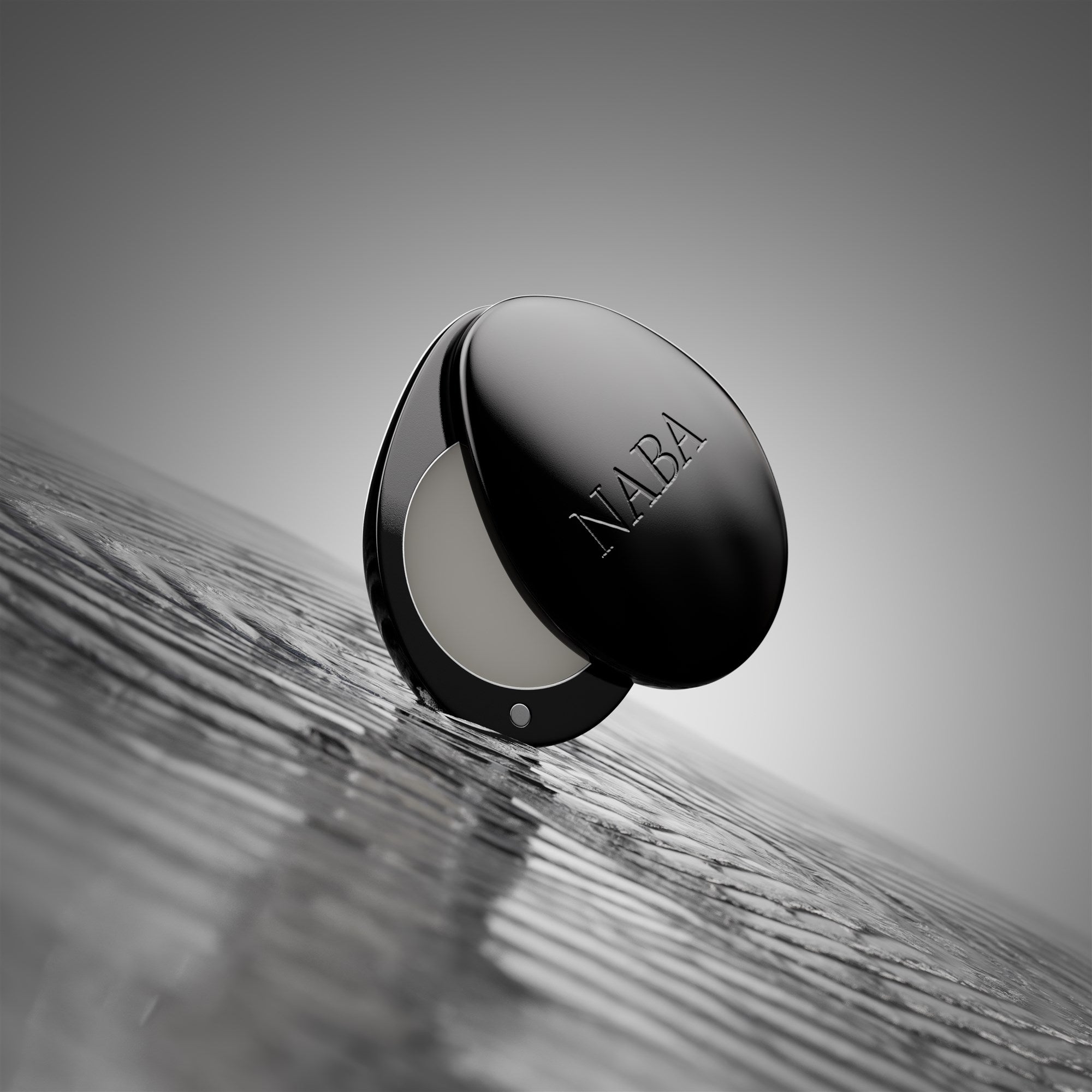 Open Black NABA case resting on a textured surface
